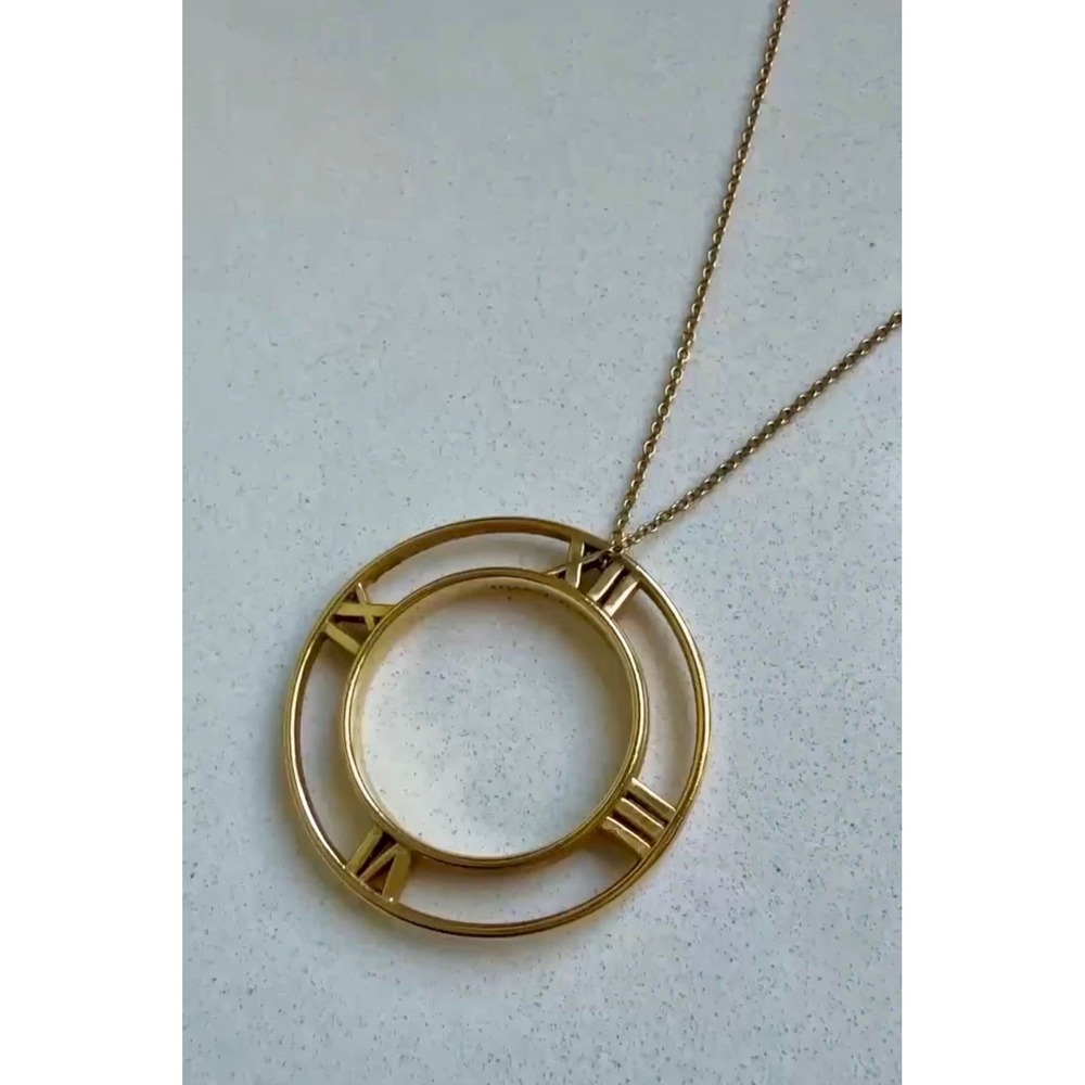 Tiffany & Co Atlas Open Medallion Necklace 18k Yellow Gold Roman Numeral Pendant